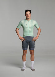 LIGHT GREEN JERSEY + TITANIUM BIBS + WHITE/GREY SOCKS