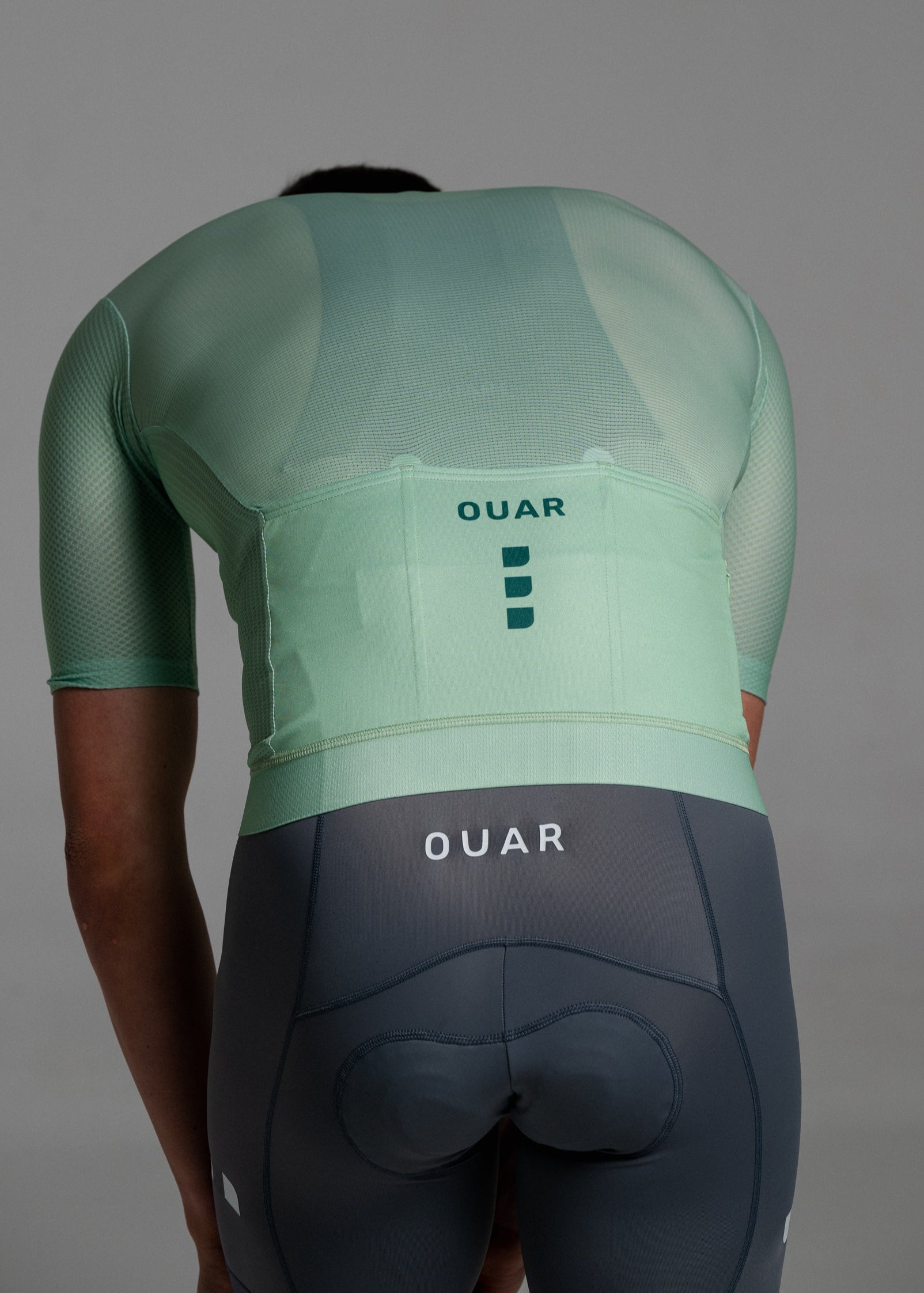 LIGHT GREEN JERSEY + TITANIUM BIBS + WHITE/GREY SOCKS