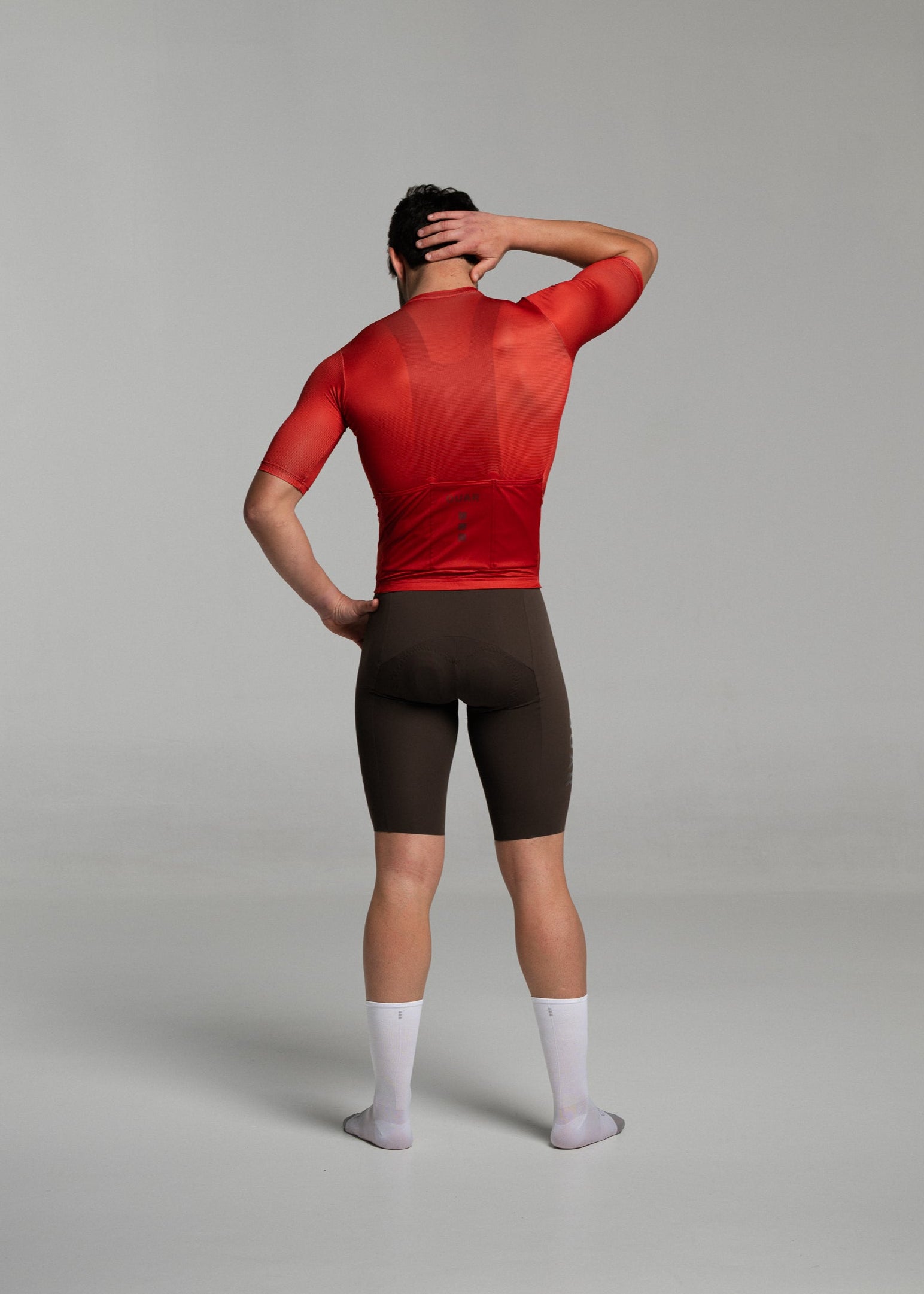 BURNT RED JERSEY + COCOA BIBS + WHITE/GREY SOCKS
