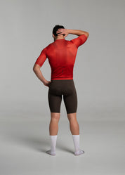 BURNT RED JERSEY + COCOA BIBS + WHITE/GREY SOCKS