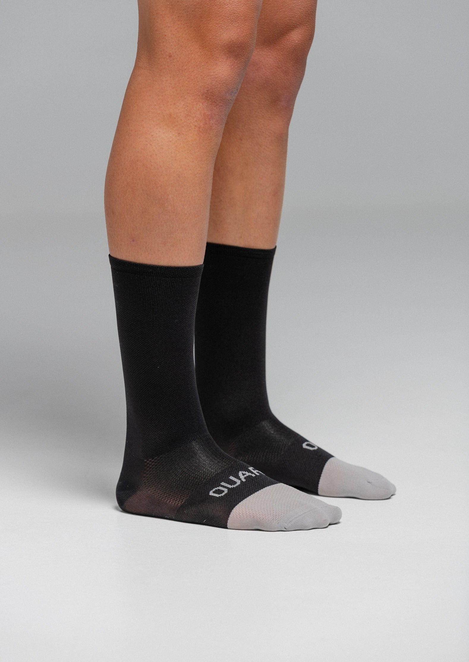 PURE BLACK JERSEY + STONE EVO BIBS + BLACK/GREY SOCKS