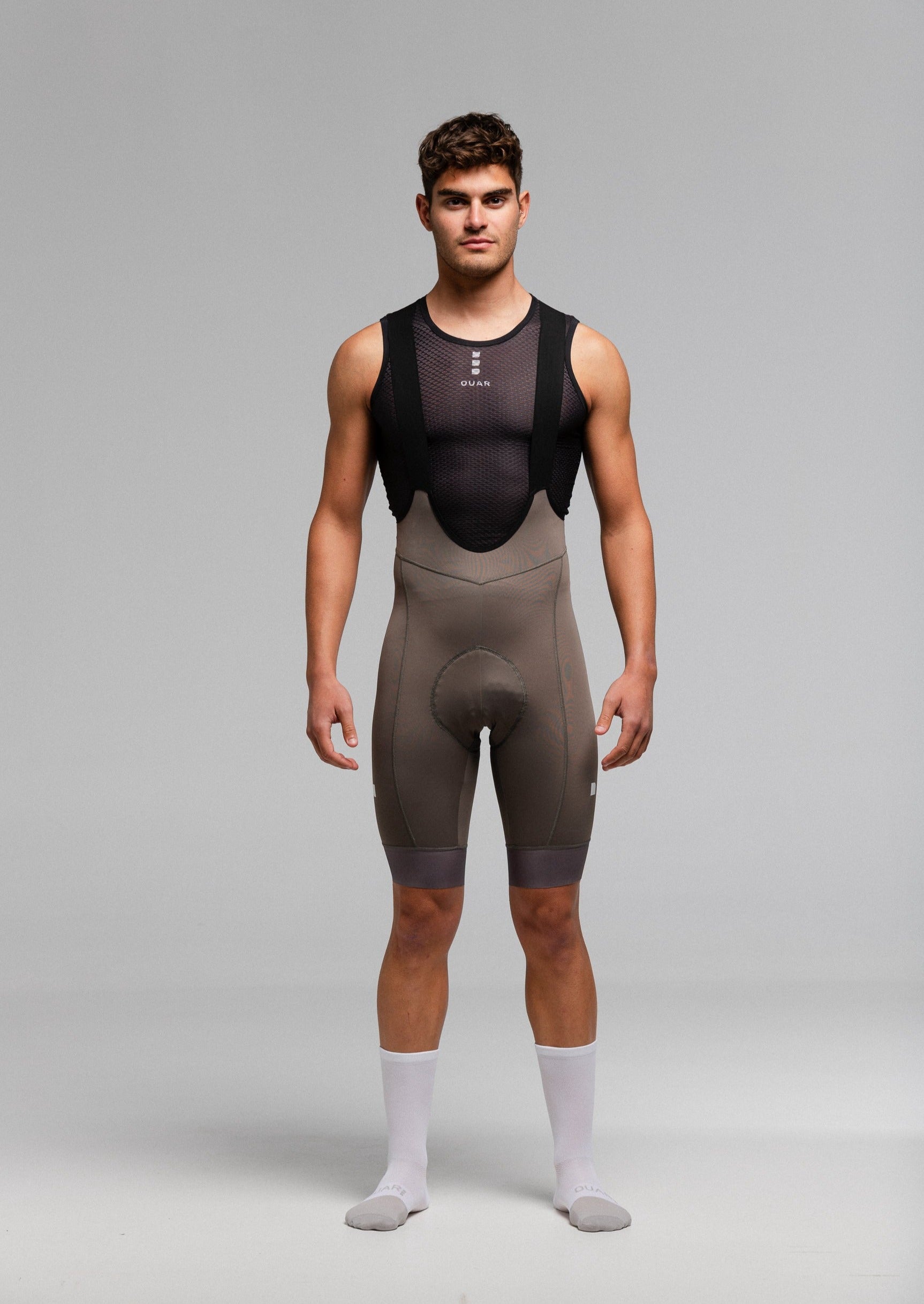 PURE BLACK JERSEY + STONE EVO BIBS + BLACK/GREY SOCKS