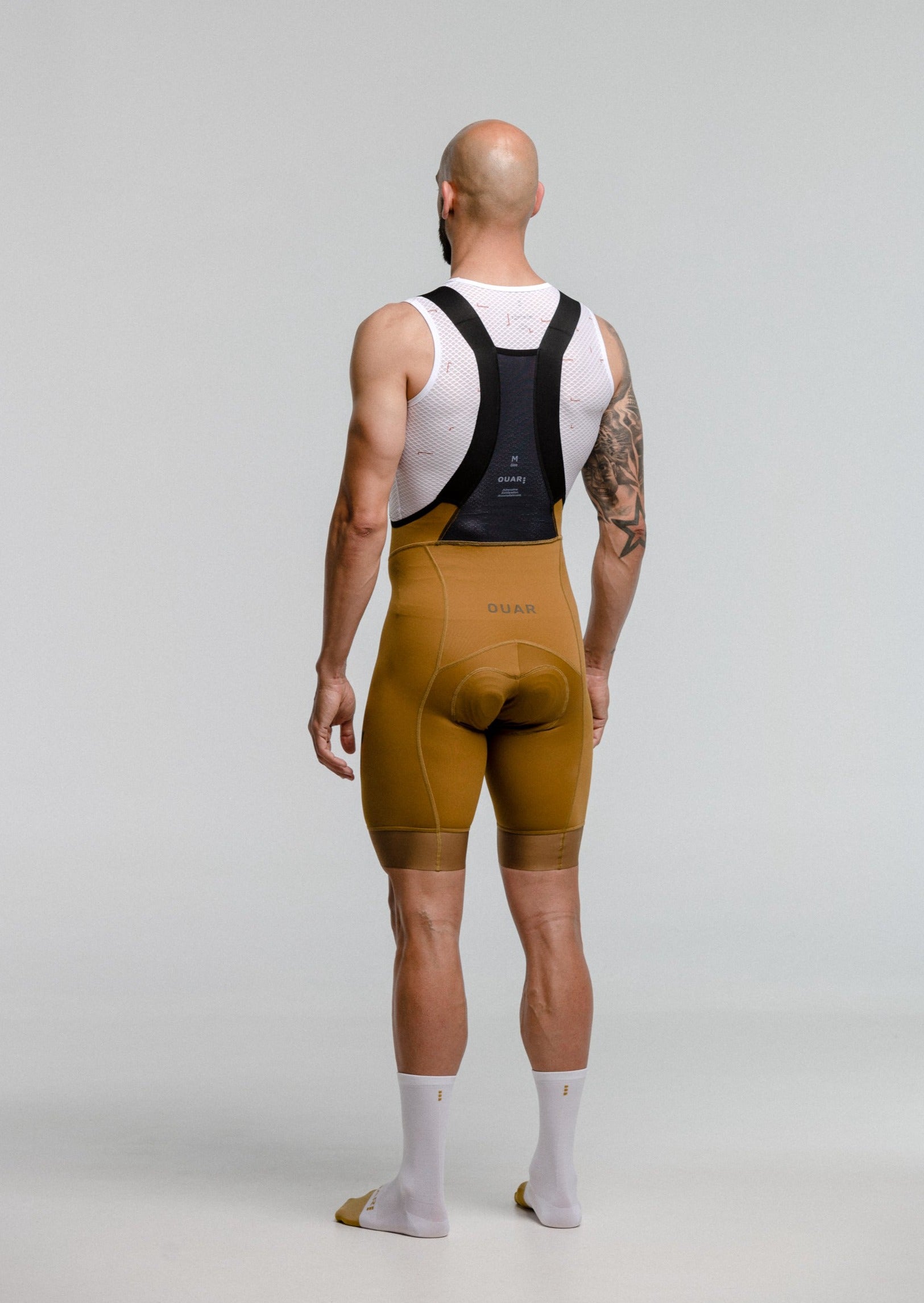 DIZZY WHITE JERSEY + TERROIR EVO BIBS + WHITE/AQUA SOCKS